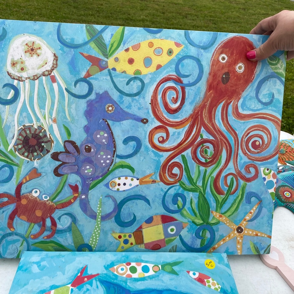 Ocean themed canvas prints and fish wall hangings.